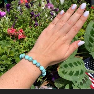 NWOT Aqua blue beaded elastic bracelet